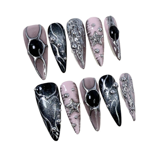 Metallic hand-painted nail art with long pointed nails, 3D effect, sweet and spicy style, cat-eye design, wearable nails, all handcrafted.