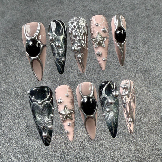 Metallic hand-painted nail art with long pointed nails, 3D effect, sweet and spicy style, cat-eye design, wearable nails, all handcrafted.